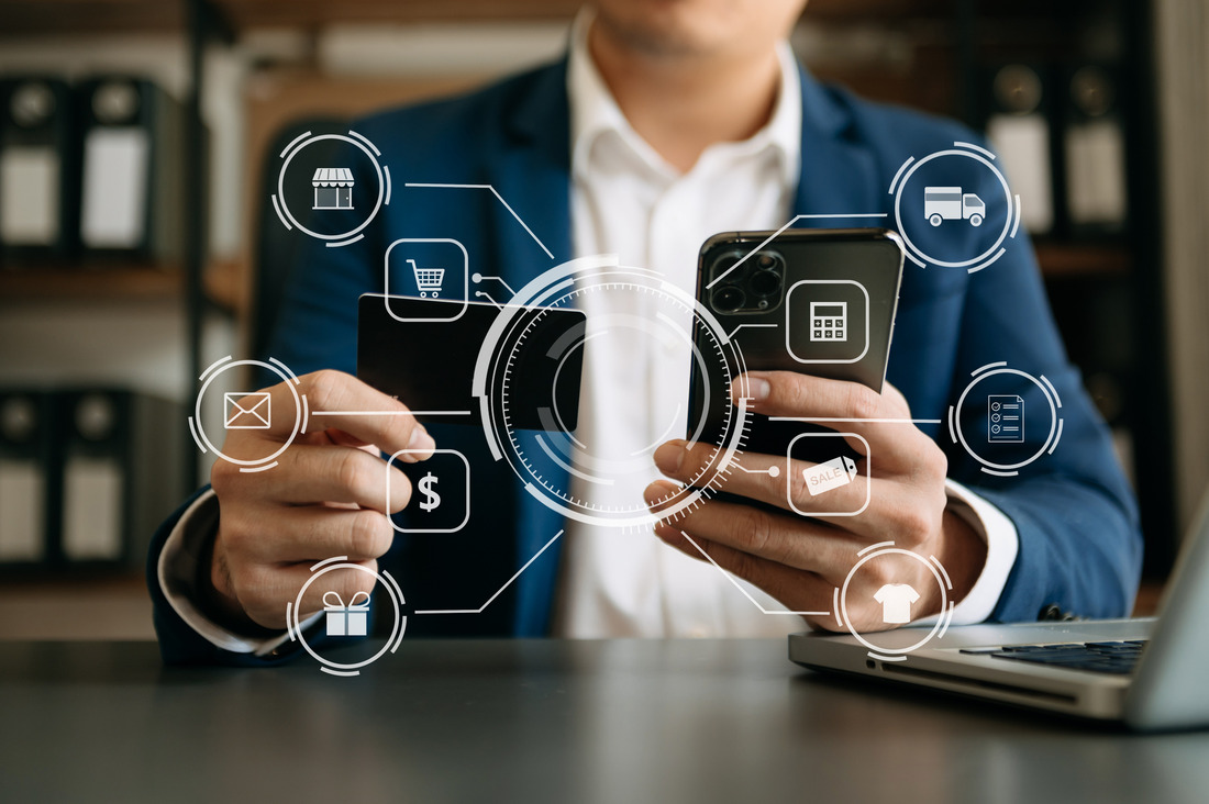 AI-Driven Personalization in B2B Ecommerce Enhancing Customer Experience and Sales Person using device with interactive ecommerce icons, depicting business success with b2b ecommerce platform personalization