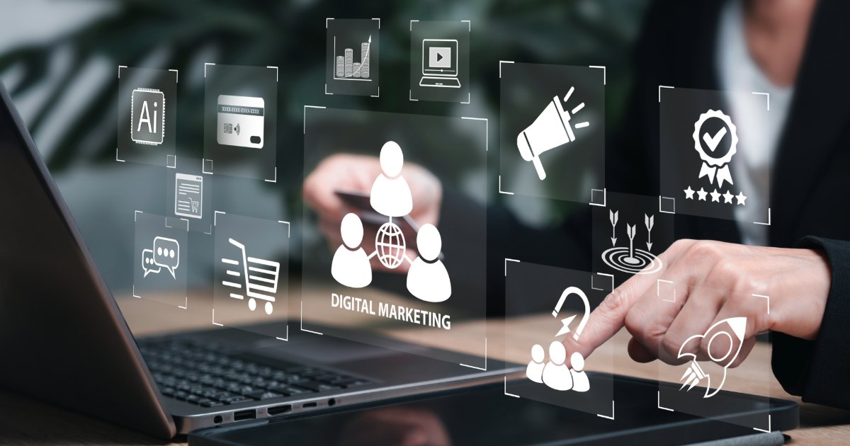 Person using digital devices, engaging with b2b ecommerce digital marketing tools like SEO, AI, analytics, and more.