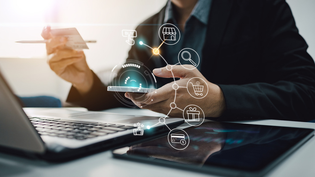 Top Cyber Shopping Trends to Elevate Your Retail Website Person using digital devices while shopping online, representing business success with ecommerce platform for retailers